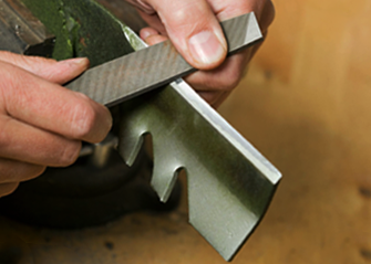 sharpening lawn mower blades